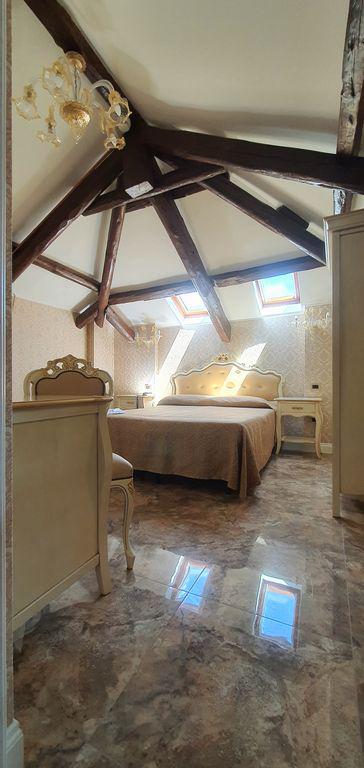 Letto camera doppia deluxe con Jacuzzi